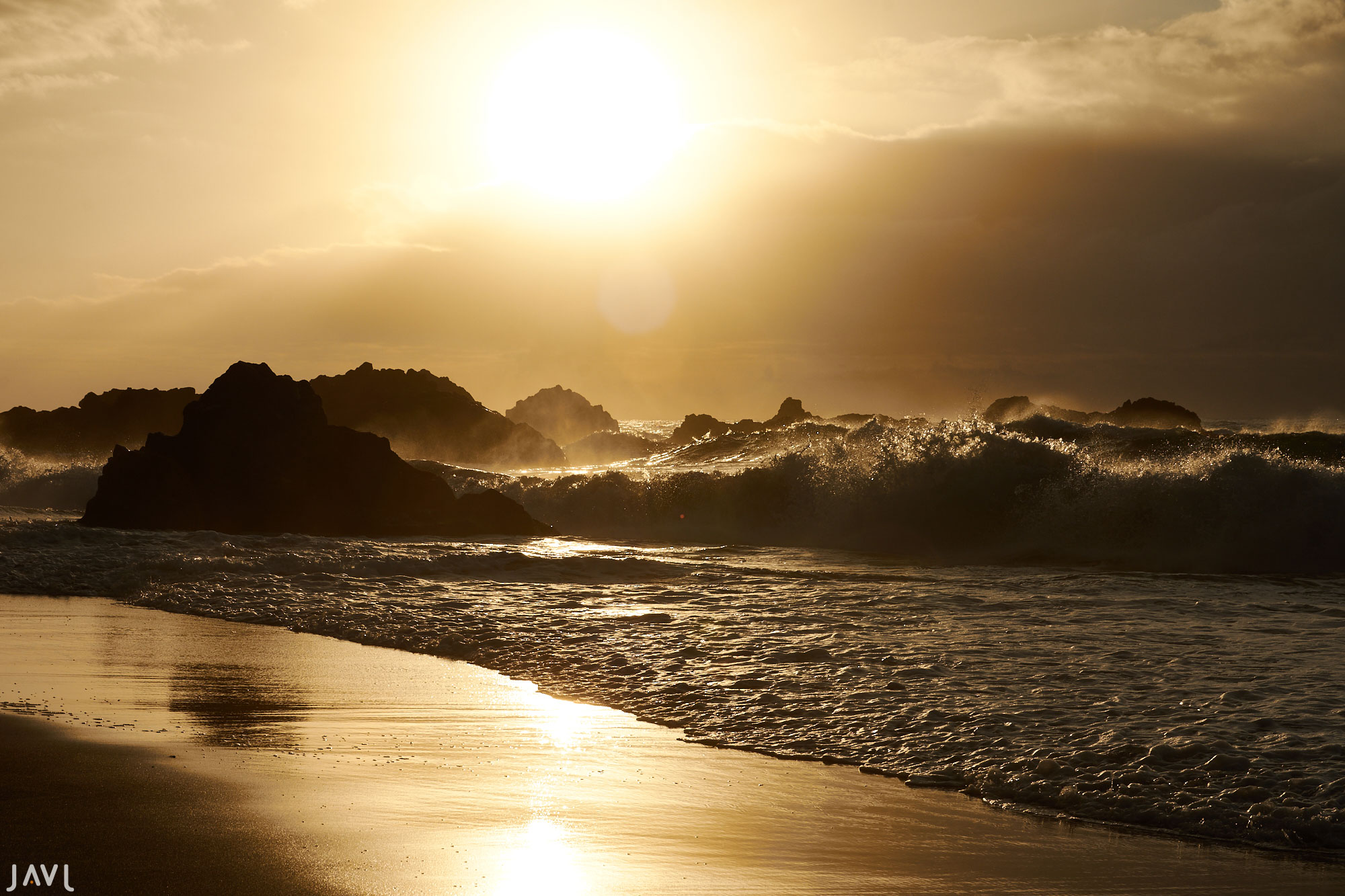 Puesta de sol en la playa del Bollullo